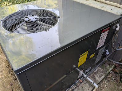 Professional ThermoSTAT Heating & Cooling    specialist servicing furnace, trusted HVAC repair in home basement