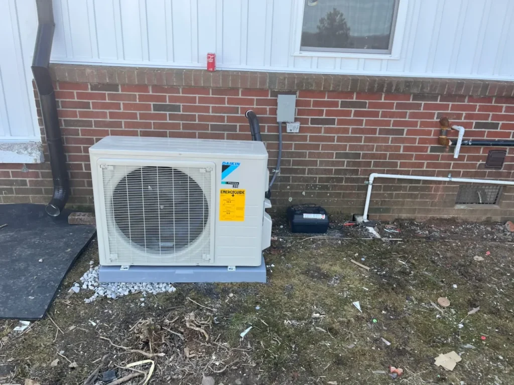 Technician installing ductless split system for ThermoSTAT Heating & Cooling