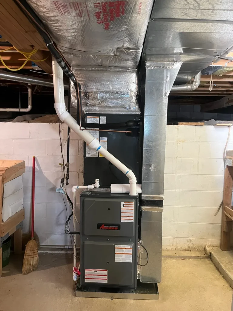 ThermoSTAT Heating & Cooling specialist repairing furnace, trusted HVAC service